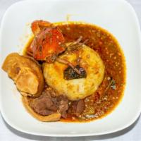 Banku & Okro Stew · Protein options: fish, crab, turkey, wele, cow foot or goat meat.