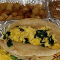 Breakfast Taco Plate · Two breakfast tacos with refried beans and skillet potatoes. Add Cheese, Fajita or Brisket f...