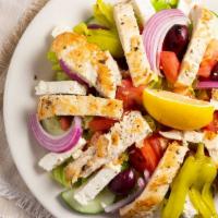 Greek Salad · Black olives, greek feta cheese over lettuce, tomato, cucumber, green pepper, onion, and our...