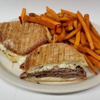 New Yorker Panini · Roast beef or pastrami, swiss cheese, coleslaw and Russian dressing.