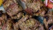 Lamb Kabob · Chunks of boneless lamb marinated in our special sauce and grilled over open fire, served wi...