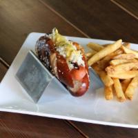 Traditional Brat W/ Chips · Michigan made Dearborn brat topped with sauerkraut and dirty blonde mustard on a pretzel rol...