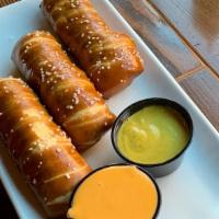 Bavarian Soft Pretzels · Dirty blonde mustard and beer cheese for dopping.