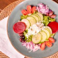 Greek Town Salad · Romaine, pickled beet, tomato, red onion, pepperoncini, cucumber, Feta, kalamata olive, and ...