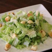 Caesar Salad · Romaine, Parmesan, house croutons and caesar dressing.