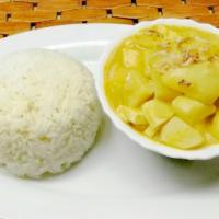 Yellow Curry · Coconut cream, potato, carrot, white onion, jalapeno and yellow curry paste.