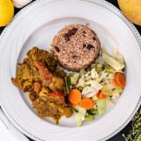 Curry Chicken Meal · Jamaican curry style chicken with rice and peas and steamed cabbage