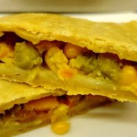 Veggie Patty · Golden flaky crust with a veggie filling (inside includes peas, corn, carrots, )