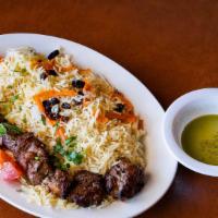 Kabob Gosfand · Chunks of tender lamb, marinated in special spices and garlic, broiled on a skewer