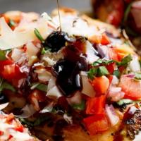 Bruschetta · Grilled bread rubbed with roasted garlic, topped with tomatoes, basil, black olives, red oni...