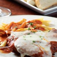 Chicken Parmigiana · Breaded breast of chicken baked in a rich tomato sauce with mozzarella cheese