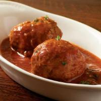 Meatballs · Two meatballs  served with tomato sauce
