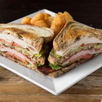 3 Way Club · This triple decker delight will charm the taste buds. Toasted marbled rye piled high with sm...