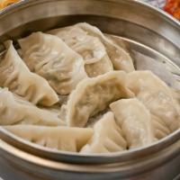 Jjin Mandu · Steamed dumplings.