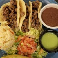 Grilled Steak Tacos · (3) served with rice,beans,lettuce,avocado and pico de gallo on side