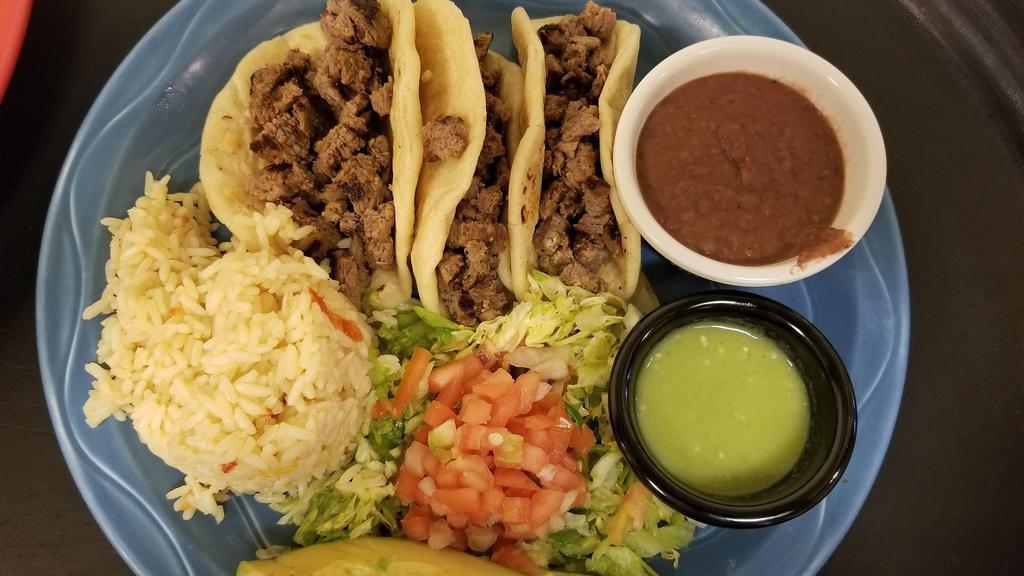 Grilled Steak Tacos · (3) served with rice,beans,lettuce,avocado and pico de gallo on side