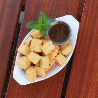 Crispy Tofu Appetizer · Soft tofu lightly fried to golden brown, serviced with house blended soy sauce