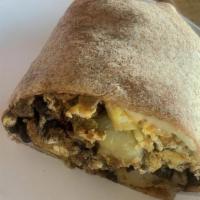 Chorizo Breakfast Burrito · Eggs, veggie chorizo, homestyle potatoes, grilled onions, black beans, Jack cheese and signa...