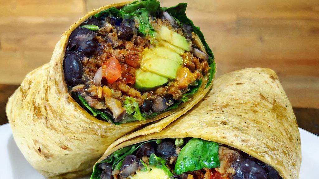 Chipotle Wrap · Pico de gallo, black beans and signature chipotle sauce. Served with choice of protein, side and cheese.