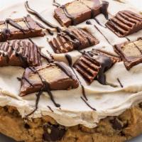 Peanut Butter Cup · Chocolate chip cookie frosted with peanut butter/buttercream frosting and topped with Reese'...