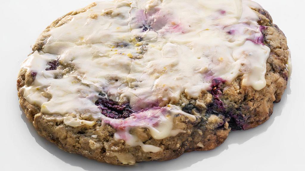 Blueberry Oat · Soft and moist oatmeal cookie with blueberries topped with a fresh squeezed orange glaze.