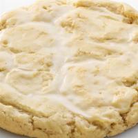 Orange Doodle · A soft snickerdoodle base cookie with a delicious orange glaze smeared over the top!