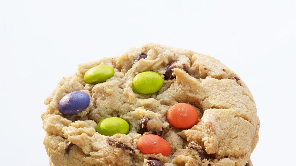 M&M Avalanche · Creamy vanilla buttercream frosting stuffed between two M&M cookies!
