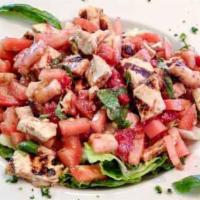 Bruschetta Salad · Grilled or breaded chicken, fresh mozzarella and homemade bruschetta over romaine lettuce, w...