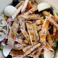 Chicken Cobb Salad · Lettuce, tomato, cucumbers, grilled chicken breast, olives, hard-boiled egg, bacon bits and ...