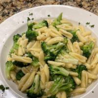 Cavatelli Con Broccoli · Sautéed broccoli, olive oil, butter and garlic in a homemade broth.