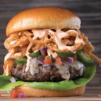 Voodoo Burger  · Blackened seasoning, pepper jack cheese, pico de gallo, fresh jalapeños, Tabasco®-fried onio...