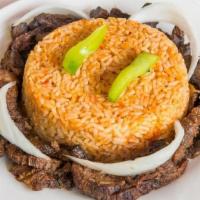 Jollof Rice & Suya · Grilled beef topped with suya seasoning (contains nuts).