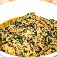 Egusi Soup · Grounded pumpkin seeds, cooked with spinach.