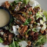 Brussel Sprout Salad · Flash fried brussel sprouts, spring mix, iceberg lettuce, walnuts, cherries, bleu cheese all...