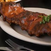 Whole Slab Rib Dinner · Slow cooked on our rotisserie until cooked to perfection. Served with loaf of bread choice o...