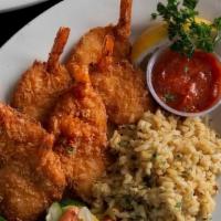 Fried Jumbo Shrimp Dinner · Seven fried shrimp served with a cocktail sauce. Comes with choice of starch, vegetable of t...