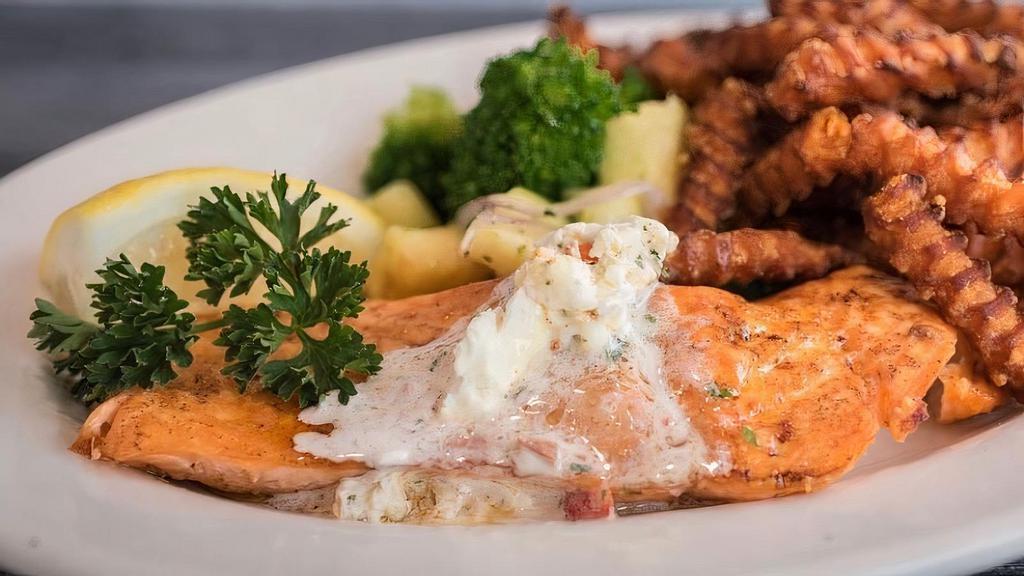 Broiled Atlantic Salmon · Fresh cut salmon broiled and lightly seasoned with a lemon parsley butter. Comes with choice of starch, vegetable of the day, garlic bread and coleslaw. Gluten free.
