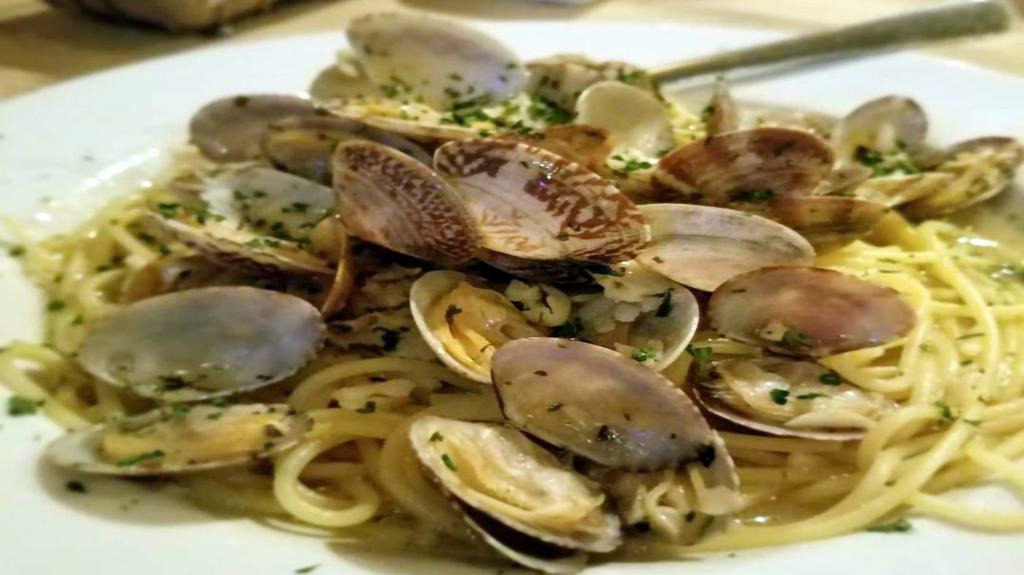 Spaghettini Vongole · Fresh native baby clams, DOP olive oil, garlic, parsley, peperoncino and imported De Cecco spaghettini.