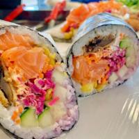 Dancing Jack* · Raw salmon, romaine lettuce, cucumber, pickled red cabbage, carrots, cream cheese & spicy ma...