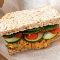 Chickpea Tuna Sandwich · Freshly baked multigrain bread toasted and topped with our house made vegan 