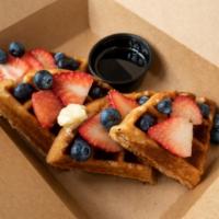 Belgian Waffle (Gluten Free) · A delicious gluten free Belgian waffle topped with fresh blueberries, strawberries, butter, ...
