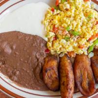Desayuno Tipico · Scrambled eggs with deep fried plantains served with beans and sour cream with your choice o...