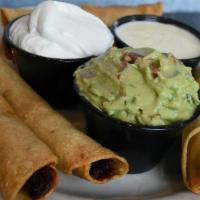 Taquitos Appz · Six crispy corn tortillas stuffed, then rolled with shredded beef or chicken. Served with si...