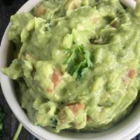 Guacamole Dip · Hass avocados, as if they were picked fresh from the family's backyard in Mexico; mixed with...