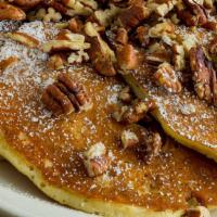 Chocolate Chip Pancakes · Rich semi-sweet chocolate chips in our buttermilk batter, dusted with powdered sugar and top...