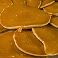 Dollar Pancakes · Melts in your mouth! Twelve(12) delicious silver dollar pancakes loved by kids and adults al...