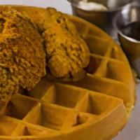 Chicken And Waffles · Breakfast and Lunch on one plate. Our tender white meat chicken pieces on top of the OPH Gol...