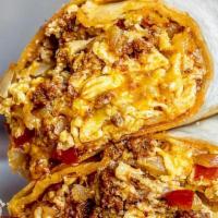 Breakfast Burrito With Chorizo · Our delicate tortillas filled with shredded hash browns, onions, bacon, red pepper and fluff...