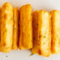 Yucca Fries · Crispy oven baked yucca with choice of salt & pepper or old bay seasoning.