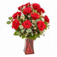 Budding Romance Bouquet · Romance blossoms spectacularly, conveying a dramatic burst of red as this wondrous bouquet b...